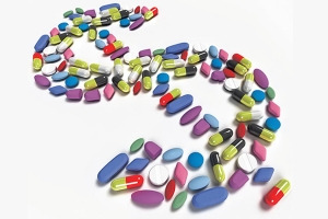 O desenho de cifrão feito com pílulas e comprimidos