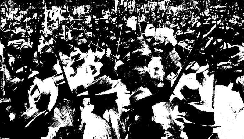 Fotografia em preto e branco de trabalhadores reunidos em manifestação, a maioria utilizando chapéus comuns na década de 50.